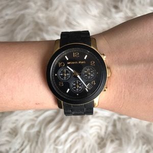 Black and gold Michael Kors watch